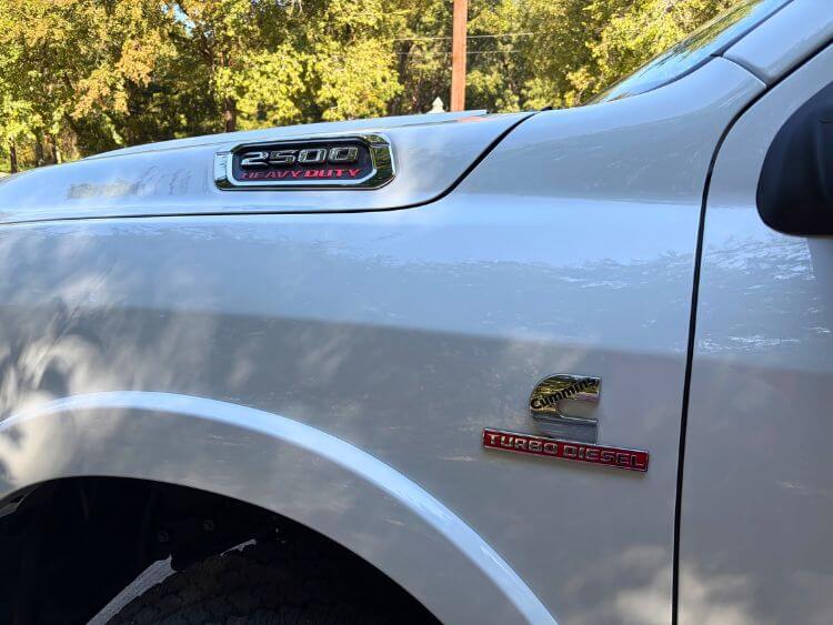 2025-ram-2500-limited-longhorn-cummins-badge-carpro