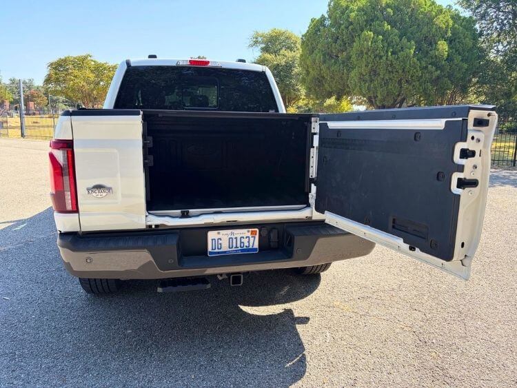 2026-Ford-F-150 King Ranch PowerBoost Hybrid-tailgate-2-carpro