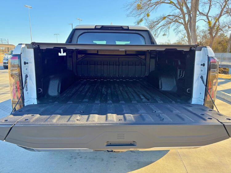 2026-GMC-Sierra-EV-AT4-truck-bed-carpro