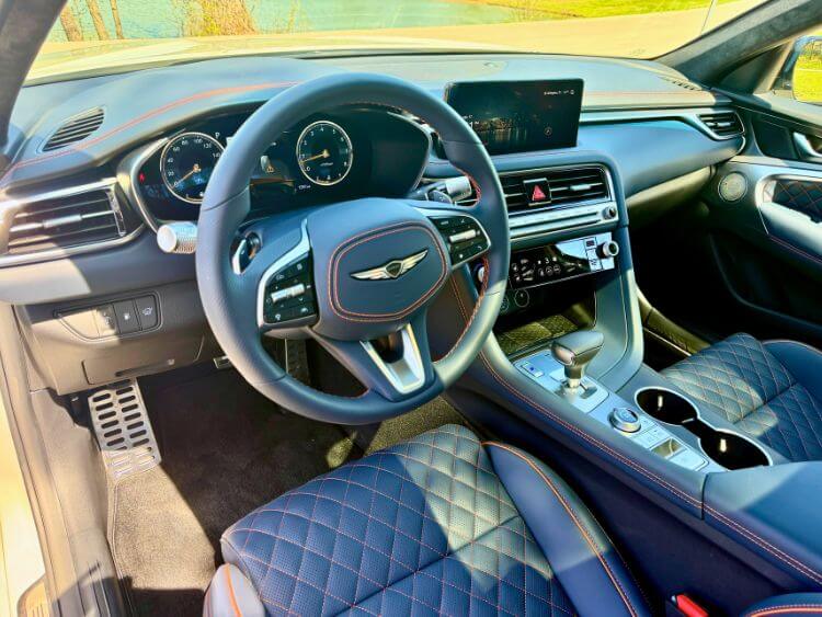 2026-genesis-g70-prestige-graphite-cabin-hero-2-carpro.j