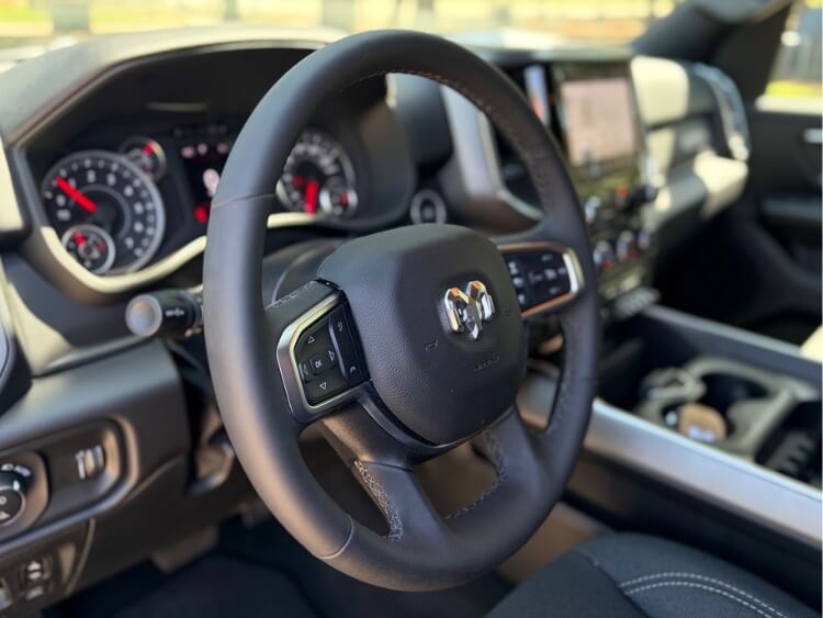 2026-ram-1500-big-horn-passenger-CU-Steering-wheel-carpro