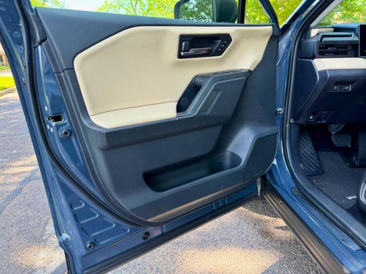2026-toyota-rav4-limited-closeup-cabin-door-panel-carpro