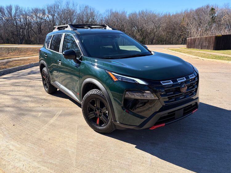 2026 Nissan Rogue Rock Creek exterior three-quarter front in natural light