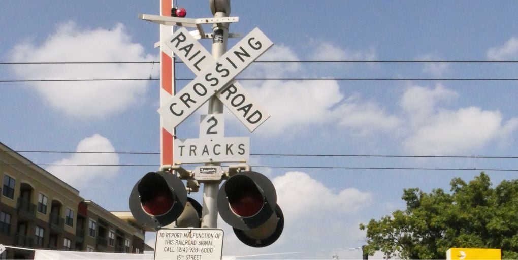 Photo Editorial Use Only.&nbsp; AUGUST 2017: Railroad crossing in Downtown Plano Station in Plano, Texas. GemStocksy/Shutterstock.com.