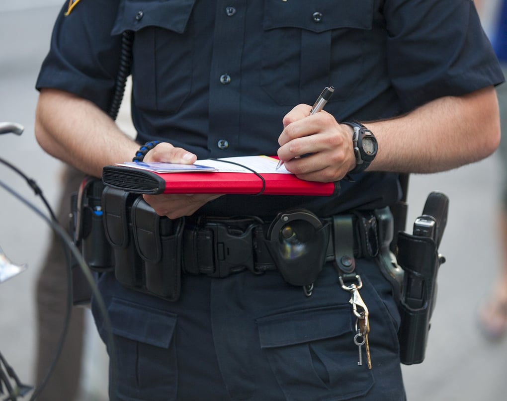 Police officer writing a ticket