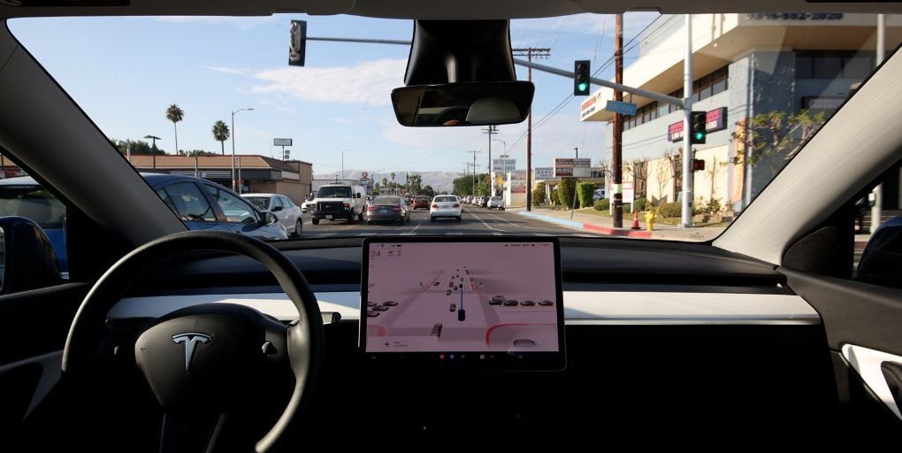 A Tesla driven by FSD (Full Self-Driving) Beta in Los Angeles, August 2022.  Editorial credit: Jose Gil/Shutterstock.com.